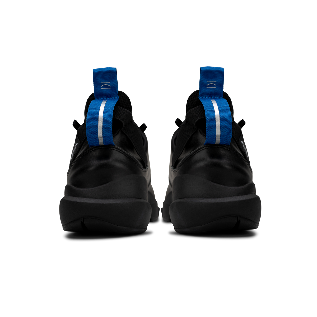 Back view,   Contera Black is a runner with Tumbled Black fullgrain leather overlays Black stretch mesh underlays, Royal Blue heel pull molded lace holder, Black eva midsole and Black rubber outsole.