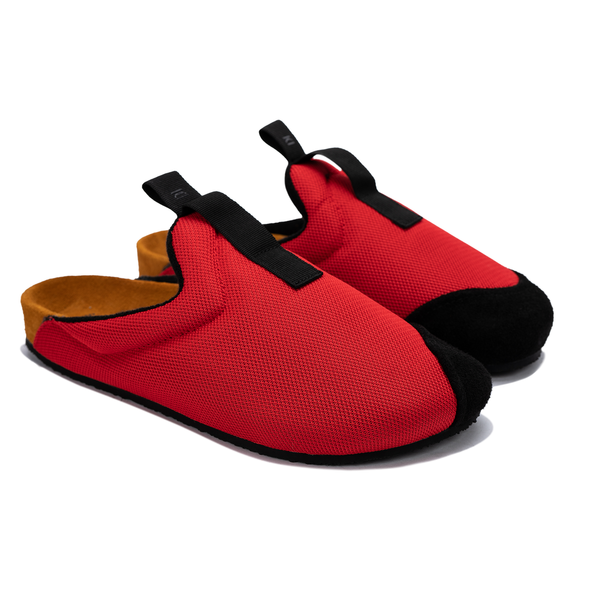 3/4 view antha 2.0 Red is a Mule made of red mesh with a Black hairy suede to overlay, cork midsole with suede top lining Black VIbram rubber bottom and woven top pull