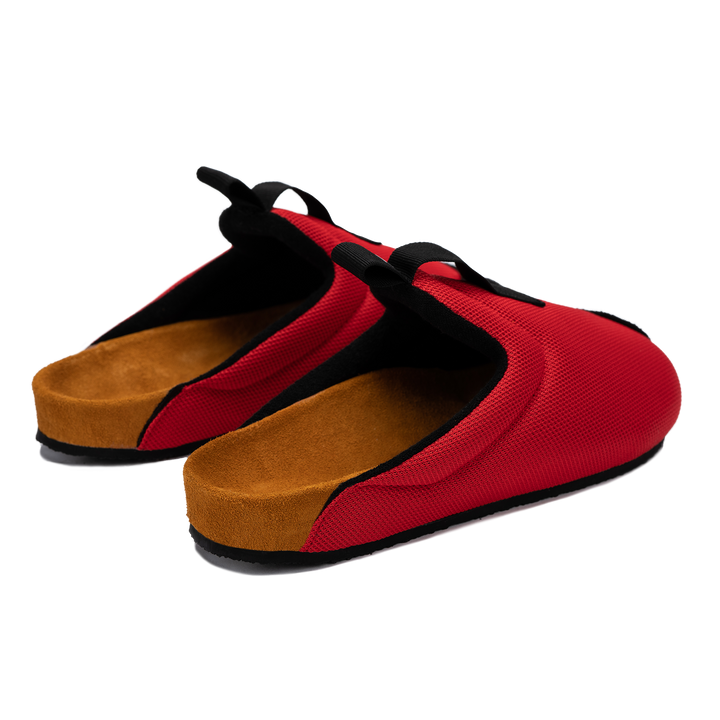 Back 3/4 view antha 2.0 Red is a Mule made of red mesh with a Black hairy suede to overlay, cork midsole with suede top lining Black VIbram rubber bottom and woven top pull