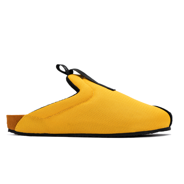 profile view Bantha 2.0 Yellow is a Mule made of Yellow mesh with a Black hairy suede to overlay, cork midsole with suede top lining Black VIbram rubber bottom and woven top pull